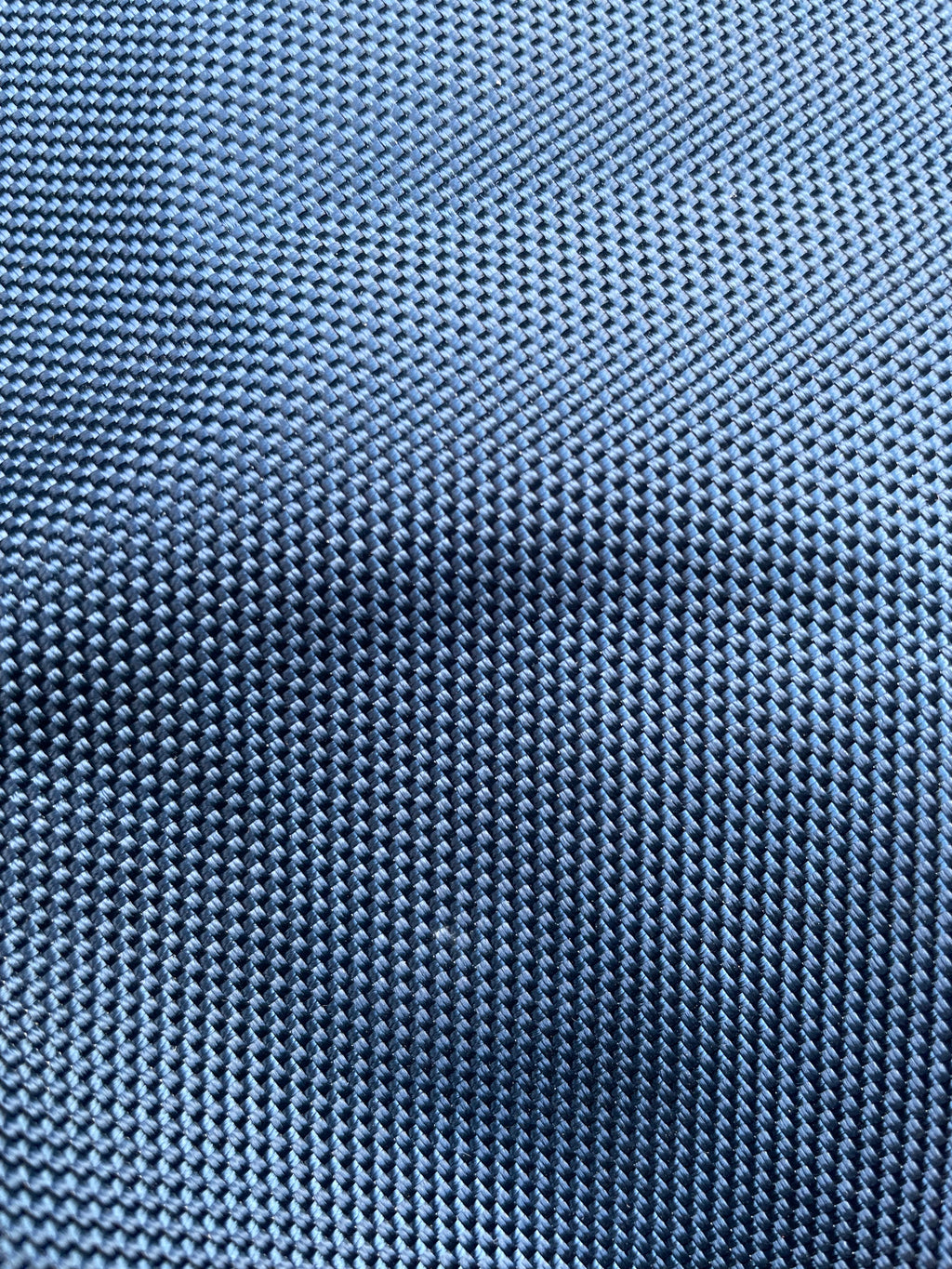Close-up of the blue ballistic outer fabric