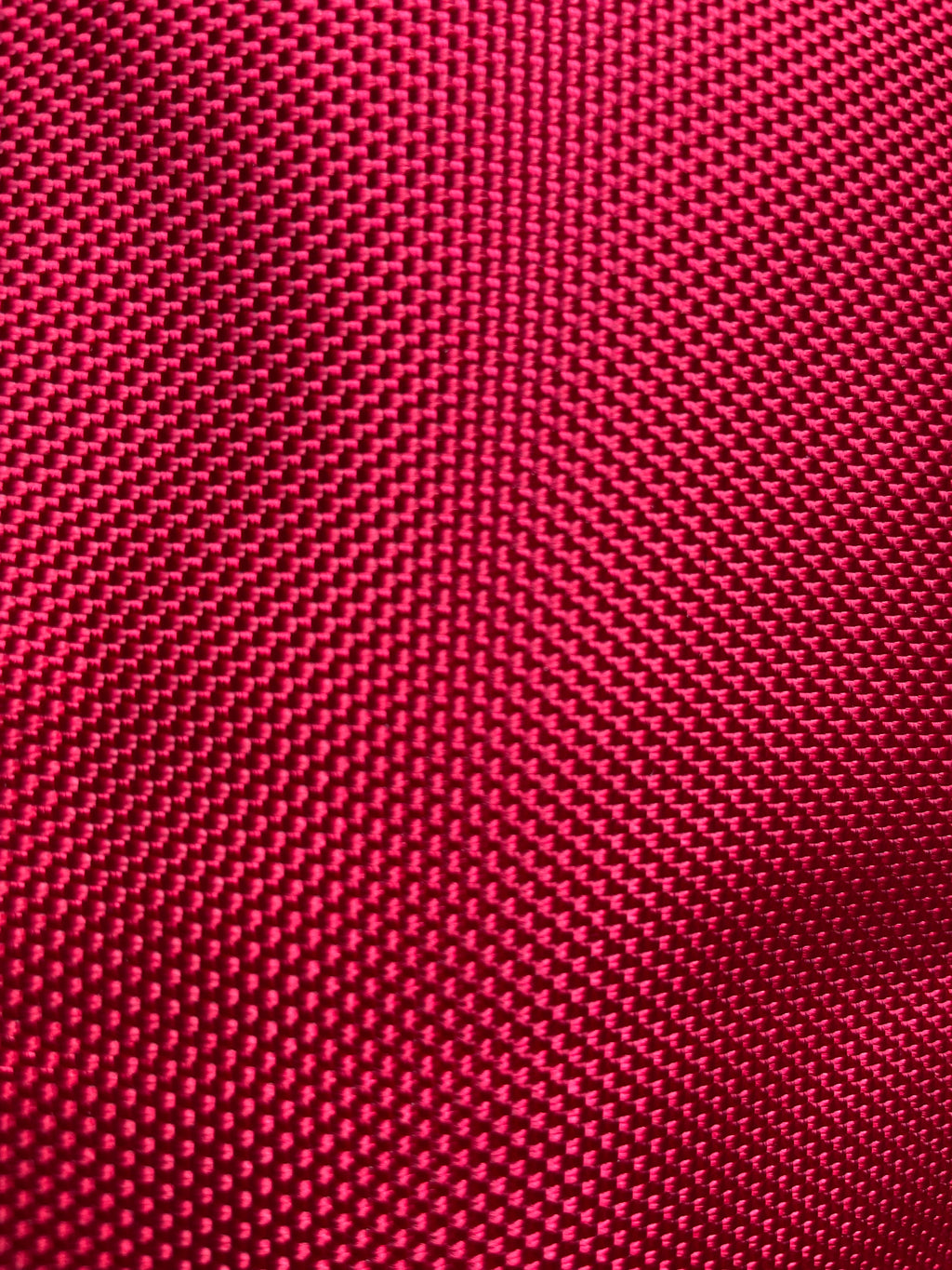 Close-up of the red ballistic outer fabric weave