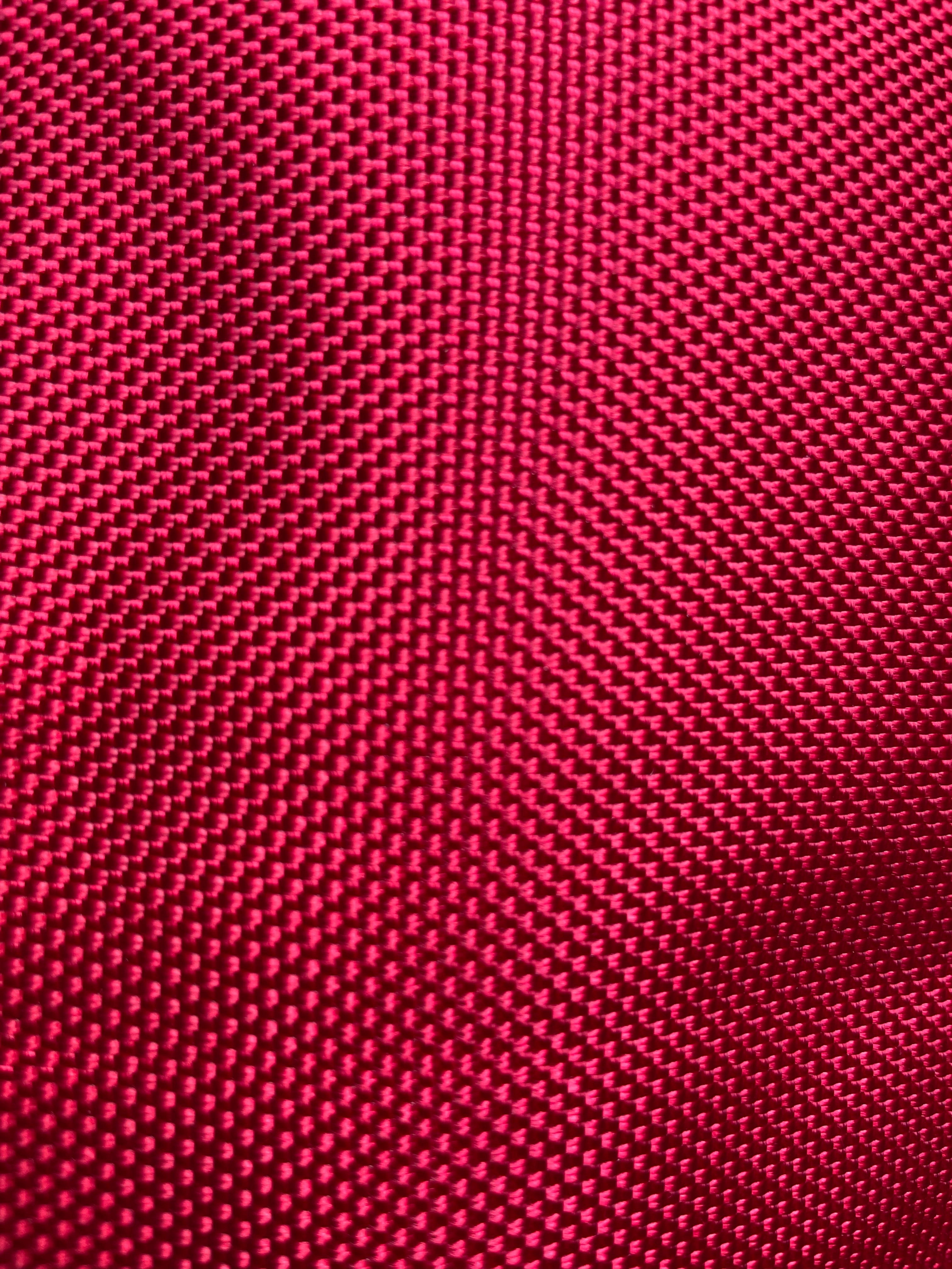 Close-up of the red ballistic outer fabric weave