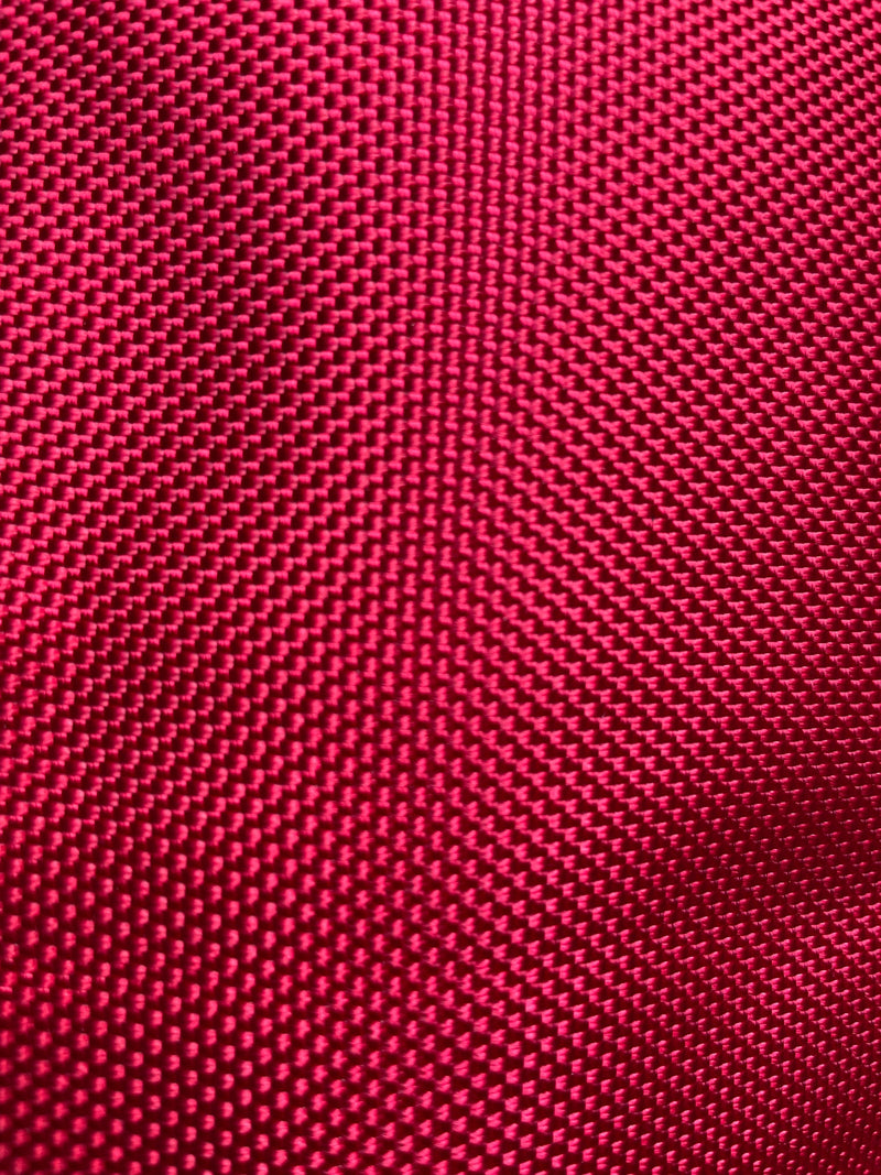 Close-up of the red ballistic outer fabric weave