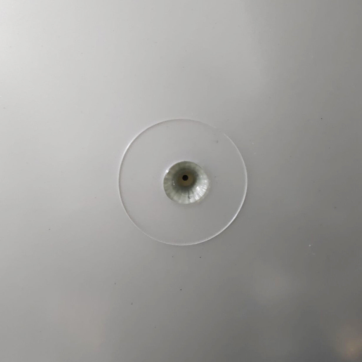 Close-up of the needle valve seated in the inner ball surface